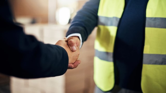 Handshake yellow vest