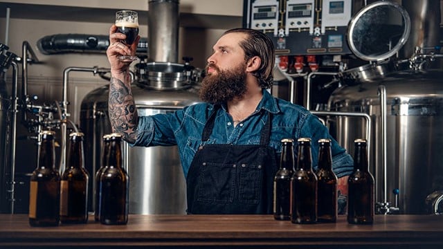 man with beer bottles 640x360