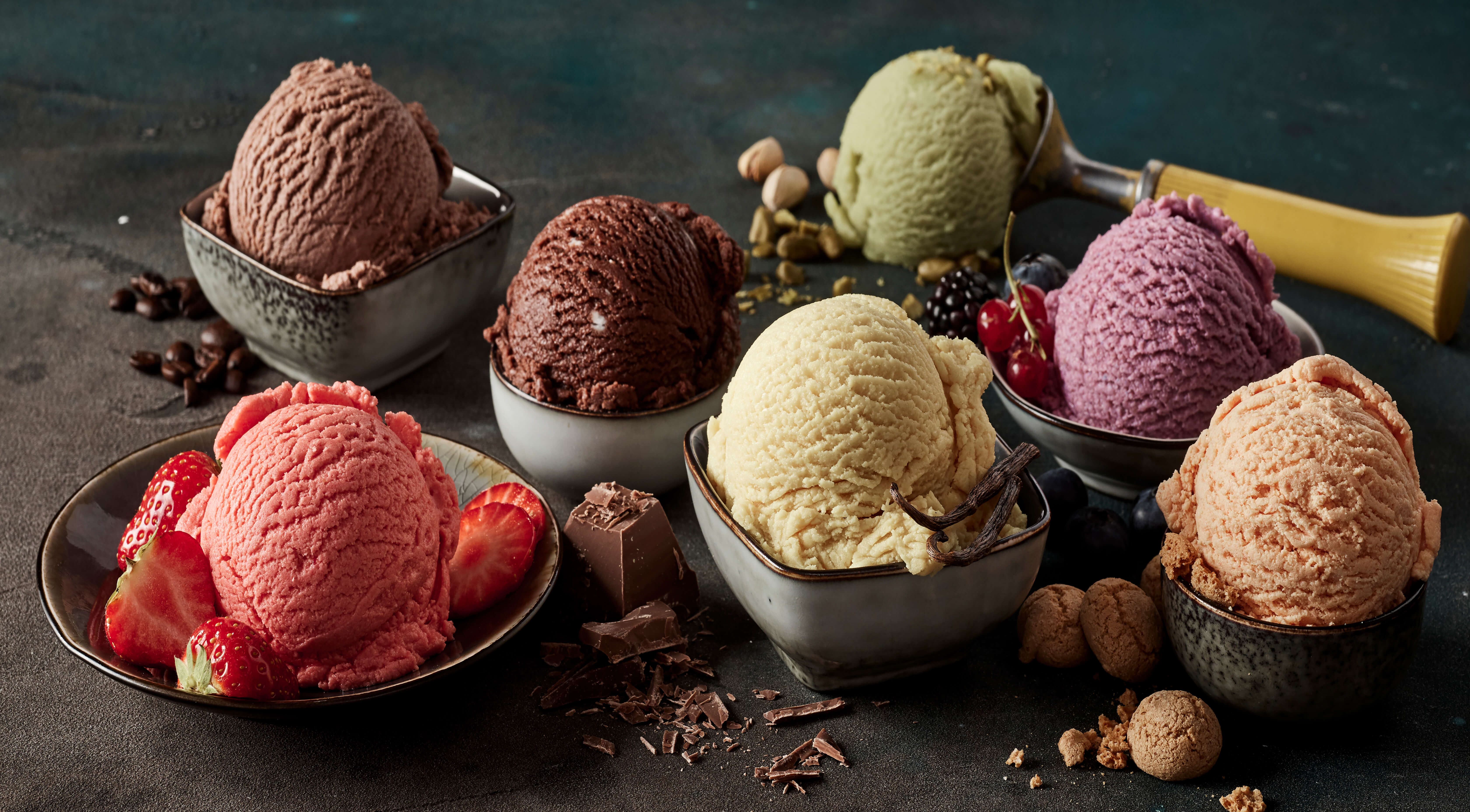 Ice cream scopes in bowls shutterstock 1647372625 larger