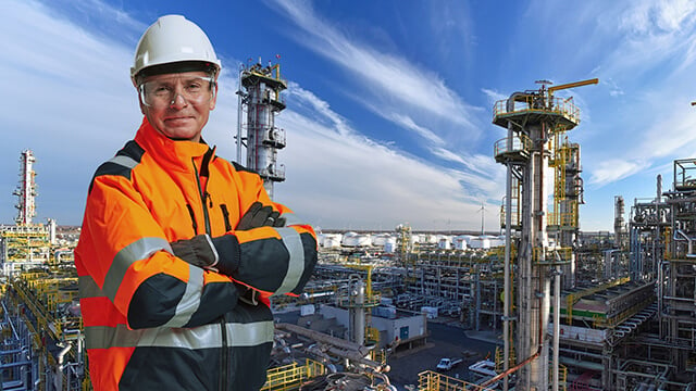 engineer-in-front-of-oil-refinery