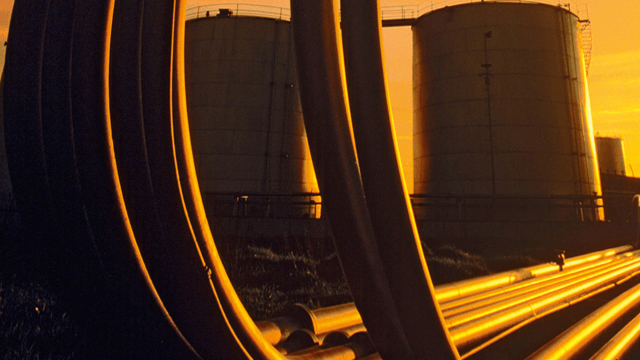 Details of oil plant in sunset