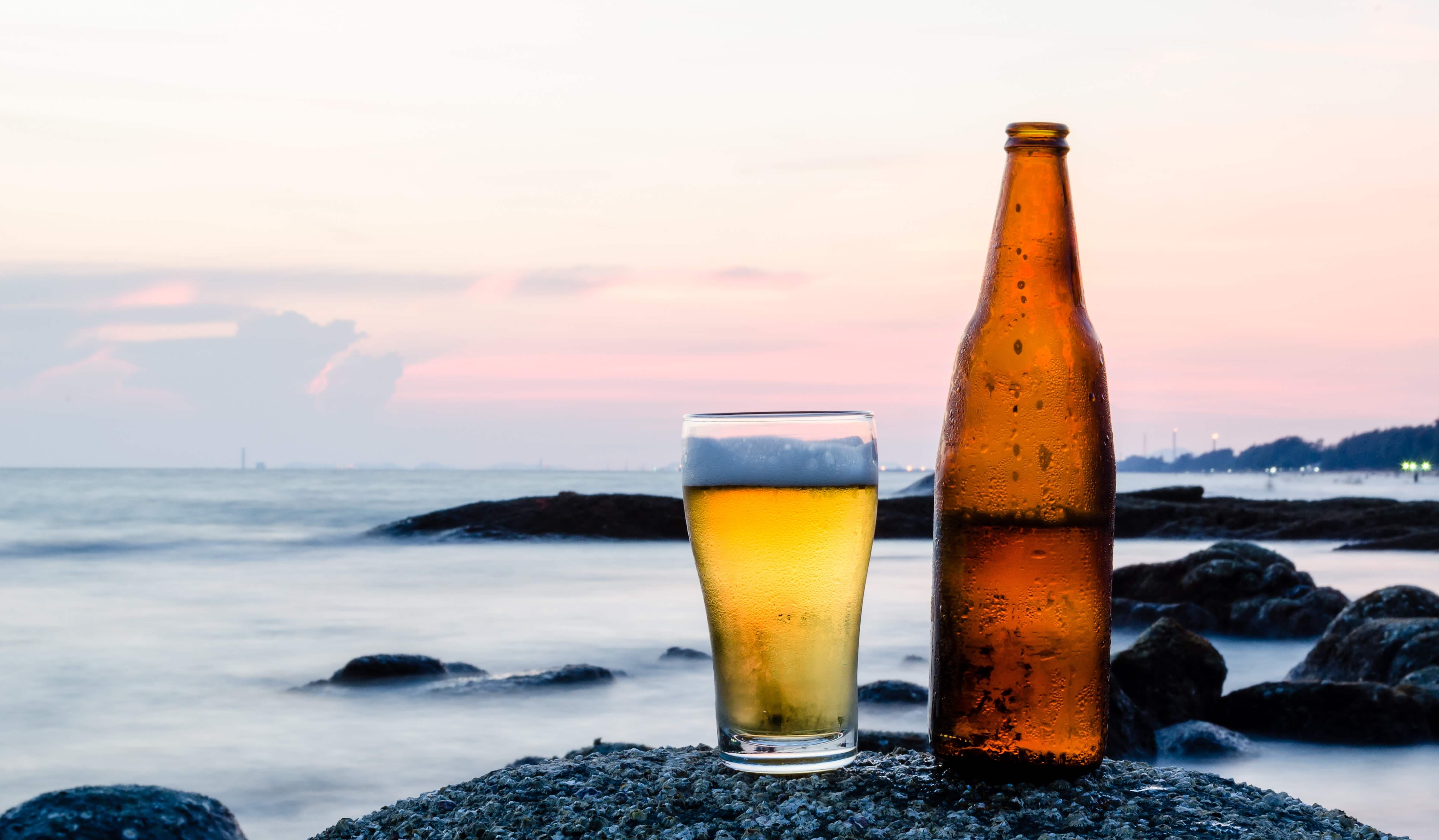 Beer with the sea in the background