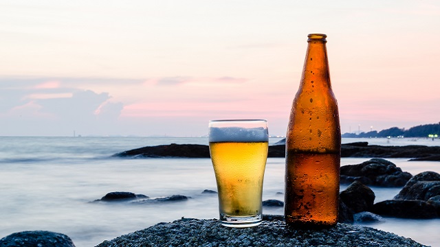 Beer with the sea in the background640x360