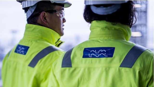 Two men with yellow Alfa Laval jackets