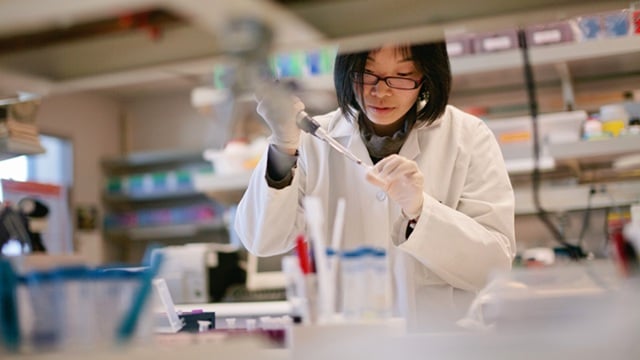 lab-scientist-using-pipette.jpg