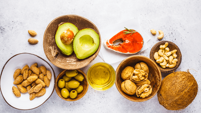healthy-high-fat-foods-avocado-salmon-nuts-olives-coconut.png