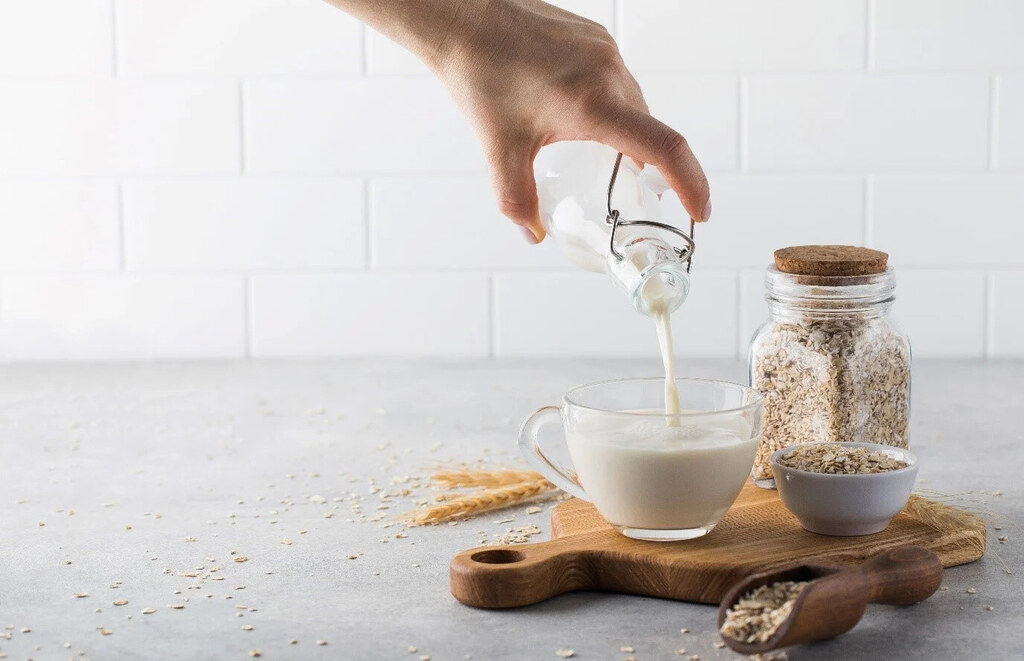 milk-being-poured-with-oats-in-background.jpg